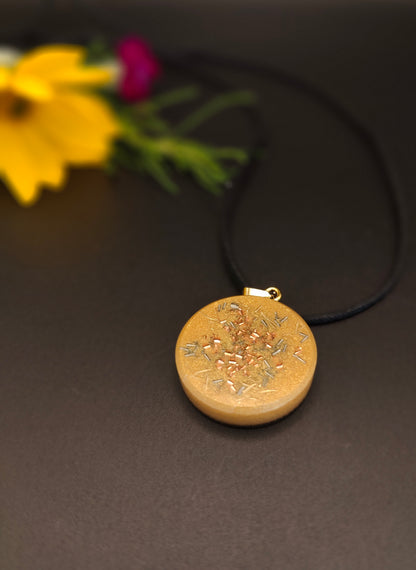 Orgon-Amulett in Gold mit einem goldenem Torus